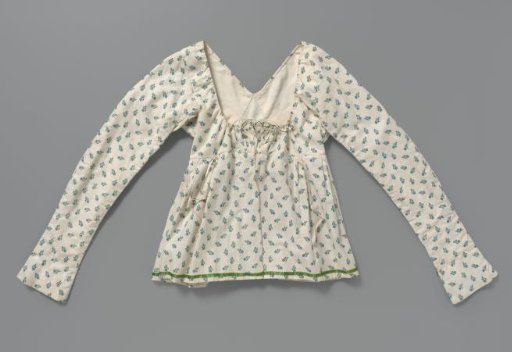 Jacket of white cotton with blue straw flowers