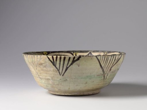 Bowl with stylized floral scrolls in green and yellow