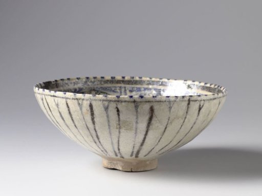 Bowl with floral scrolls and dots in blue and black
