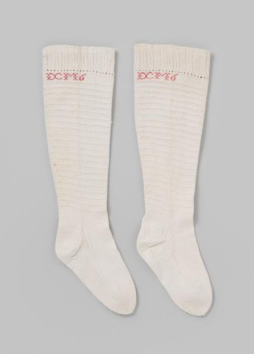 Knitted white cotton stocking in horizontal ribs with narrow ribbed border, children's size
