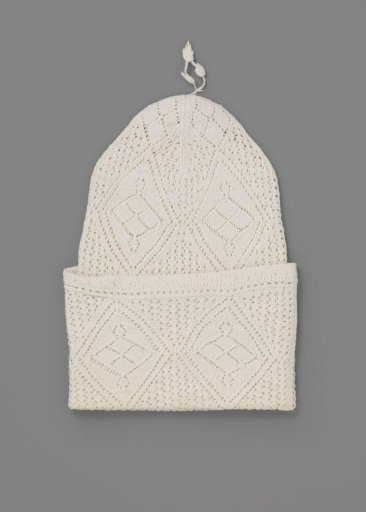 Matron's cap of double-knitted cotton with turned-up edge