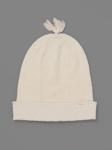 Matron's cap of knitted cotton