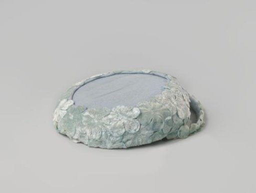 Hat of light blue silk with velvet flowers