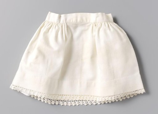 Petticoat of cotton twill with a border of coarsely crocheted shells.