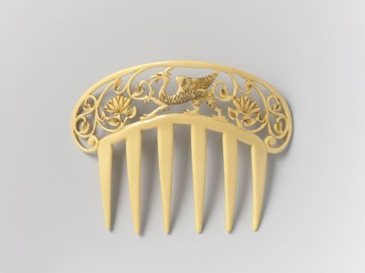 Galalith Hair Comb with a Rounded Back and an Openwork Carved Dragon in the Center