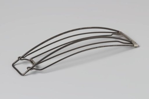 Corrugated iron (?) of steel, rectangular, in the shape of a buckle