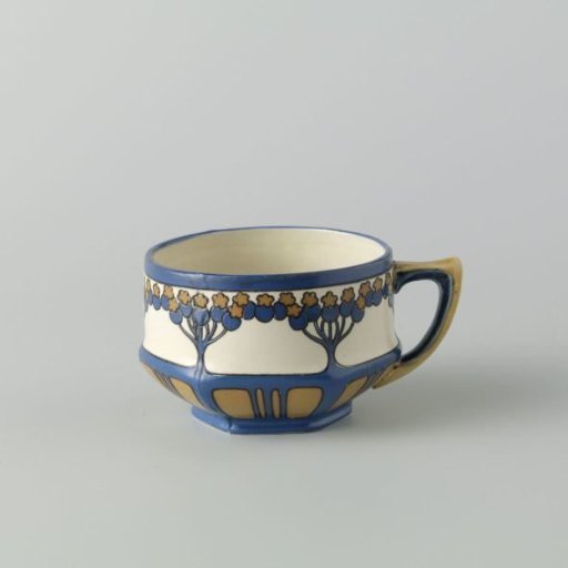 Cup, belonging to a tea service of chromolith stoneware, decorated in blue and yellow-brown