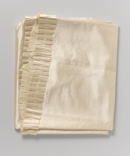 Baby blanket of cream-colored satin with a strip of the same fabric