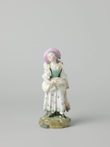 Girl with a bird in a basket and a rabbit