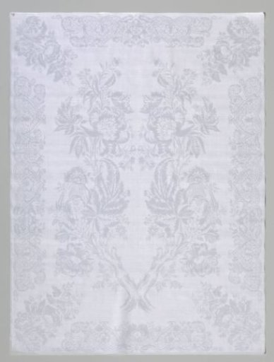 Linen damask napkin with a floral pattern