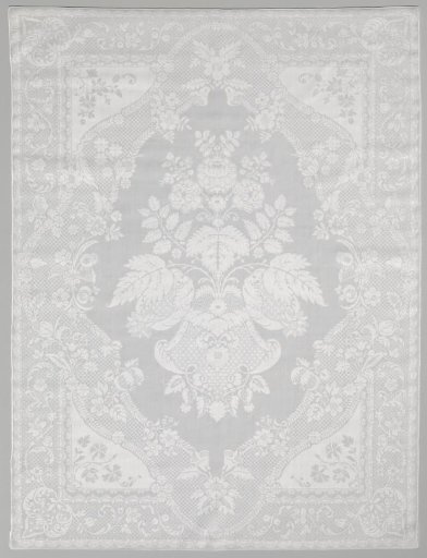 Linen damask napkin with a lace pattern