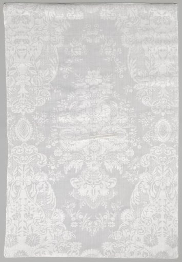 Linen damask napkin with a lace pattern