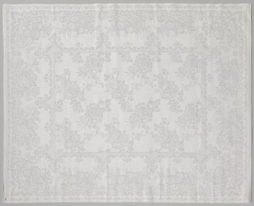 Linen damask napkin with a floral pattern