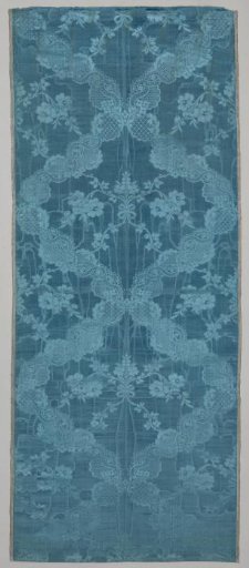 Fragment of blue silk damask with a pattern of flowers