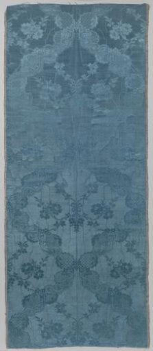 Fragment of blue silk damask with a floral pattern