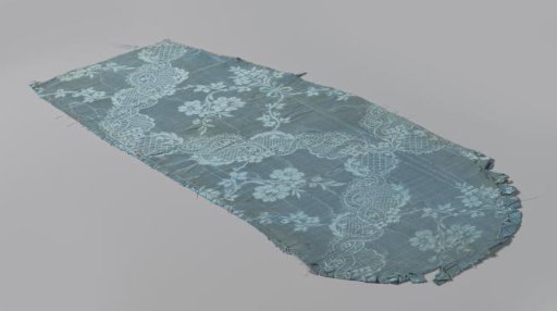 Fragments of blue silk damask with a floral pattern