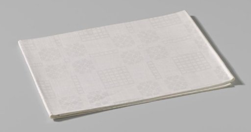 Tablecloth with a pattern of scales, waffle check and flower shape