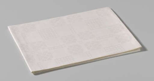 Tablecloth with pellet pattern with waffle check and flower form