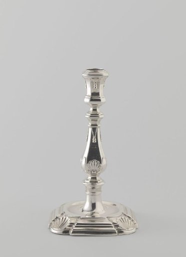 Candelabrum on a square base with indented, rounded corners decorated with shells
