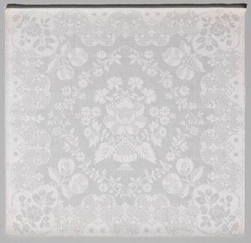 Tablecloth of white linen damask