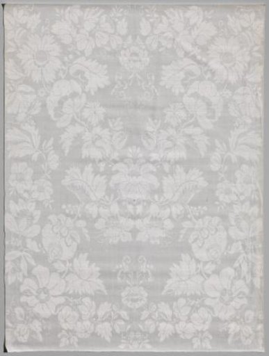 Linen damask napkin with a naturalistic floral pattern
