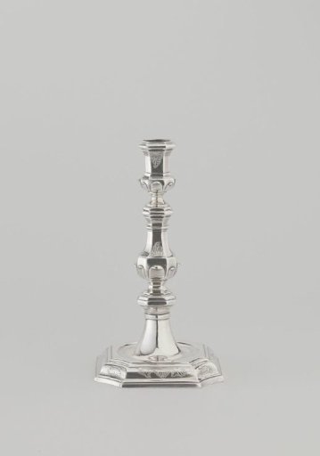 Silver candelabrum with octagonal foot and octagonal baluster-shaped stem with candle holder. Engraved with rocaille motifs.