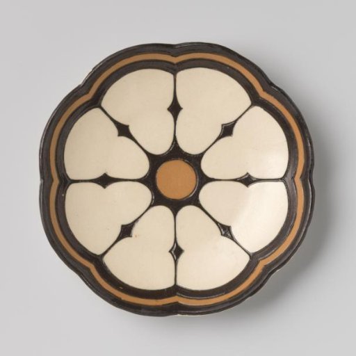 Plate decorated with a design in black and brown