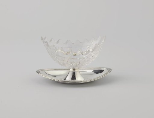 Salt cellar on oval foot with pointed oval glass bowl