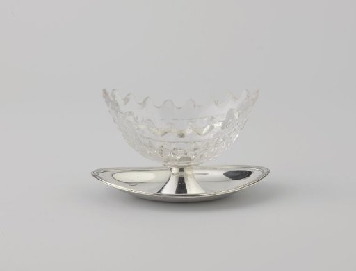 Salt cellar on oval foot with pointed oval glass bowl