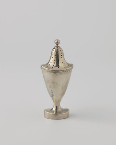 Pepper Shaker, Oval Vase-Shaped Body with a Fluted Rim along the Top. Arched Lid with Sifting Holes. Entirely on a Straight Foot. Base with Three Holes, One with Screw Thread