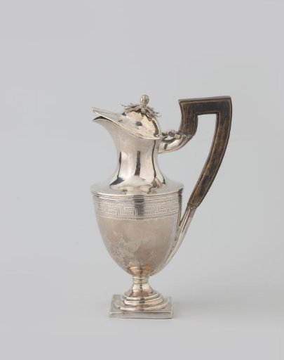 Silver milk jug, round on square, straight-sided base. Decorated with meander border. Handle of wood