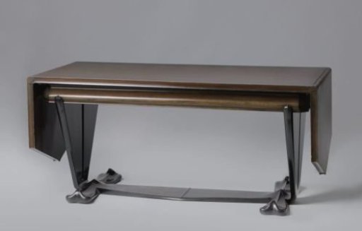 Table, elongated, with two side leaves with triangular ends, sleeve-shaped legs with upward-pointing tips with a pyramid-shaped elevation at the crossing of the connecting rule