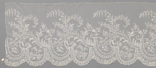 Strip of appliqué lace with wavy vine and bellflower branches