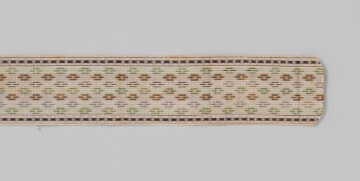 Belt ribbon of cream-colored silk in twill weave, decorated with a striped pattern in light green, light brown and lilac; along the edges runs a pearl border with a black dot in each 'pearl'