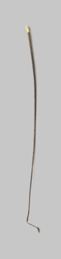 Riding whip of brown leather with an ivory knob in the shape of a beetle