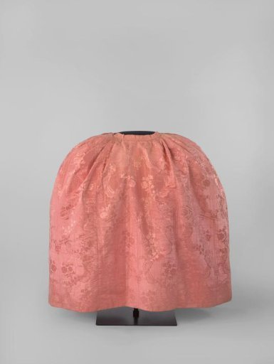 Skirt of salmon-pink silk damask with moiré effect