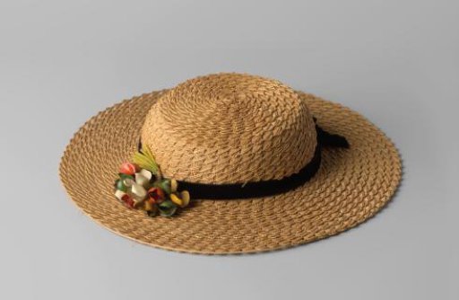 Sun hat for a girl of natural-colored straw with flower corsage
