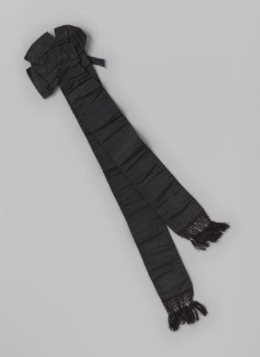 Mourning shawl of black silk; the initials T.V.B. (=Teding van Berkhout) are embroidered on the wool lining