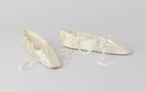 Bridal Shoe, Flat Model with Ankle Strap and Thin White Silk Ribbons of Cream Satin, Decorated with a White Satin Bow