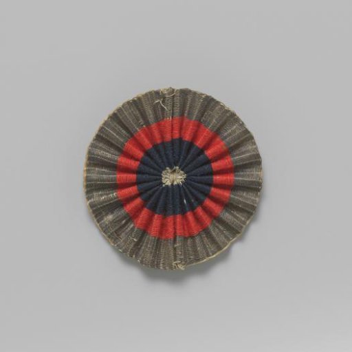 Hat Ruffle of Pleated Ribbon in Silver, Red, and Blue in the Center