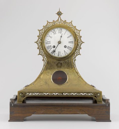 Brass Clock on a Wooden Base