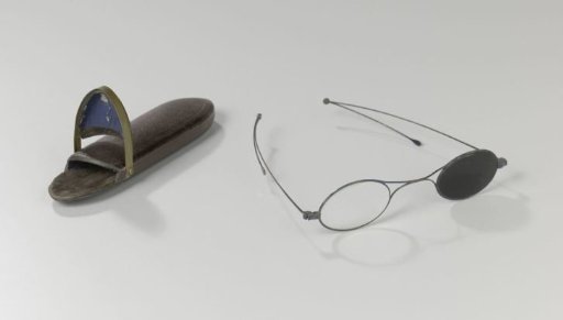 Spectacle Case in Oval Shape, Outside Plastered with Leather, with an Opening and Hinged Flap on One Side