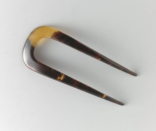 Imitation tortoiseshell hair comb, U-shaped with a smooth rounded back