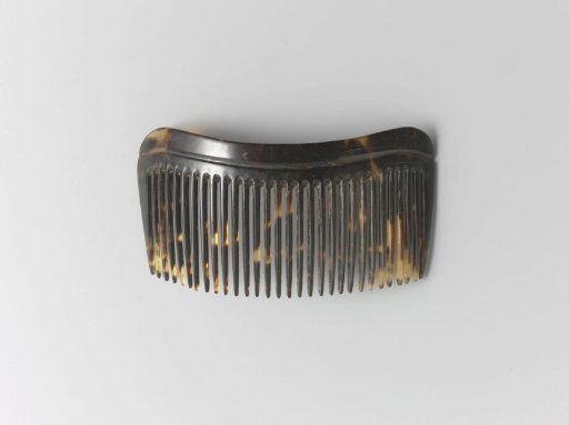 Hair comb of tortoiseshell with a narrow, slightly arched back
