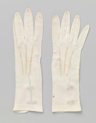 Glove of white knit fabric with a slit and two snap fasteners