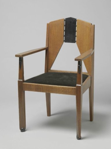 Armchair with a trapezoidal open space in the backrest