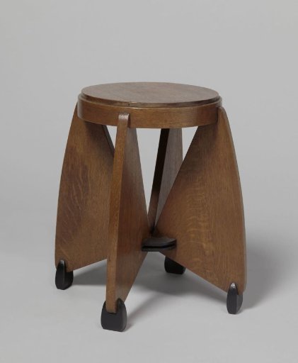 Table with a round tabletop resting on four walls facing each other, set in blocks