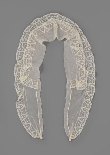 Collar of tulle with long tails trimmed with a double strip of machine-made Valenciennes lace, lying model
