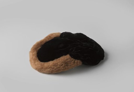 Hat of black velvet, chiffon and light brown fur