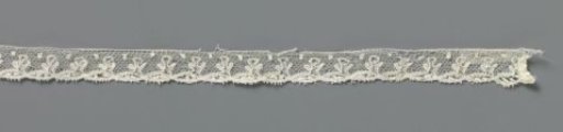 Strip of bobbin lace with pointed ovals and stylised figures